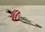 Fabulous mid-century small mercury glass tree topper in silver with white and pink banded stripes on the round base....