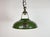 Industrial green enamel pendant light made by Coolicon in United Kingdom during the 1950s. White enamel inside the shade....