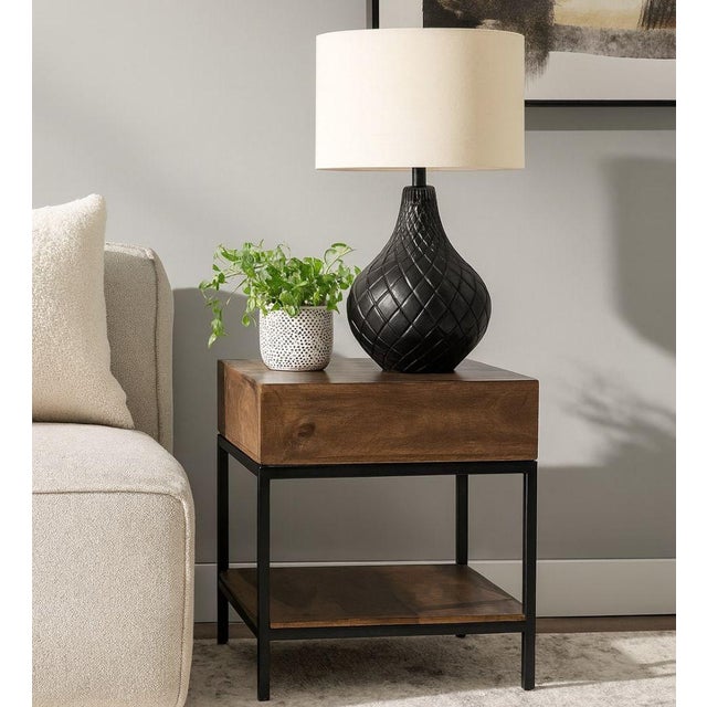 A well-proportioned end table brings both function and warmth to any living space, offering accessible storage beside a...