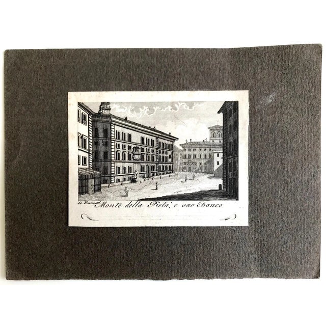 View of the Monte di Pietà and Banco dé Pegni, Rome is an original etching realized by an unknown artist in the 19th...