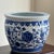 Offering a lovely Chinoiserie fishbowl-style blue & white porcelain planter from the 1980s. Gorgeous hand painted detail...