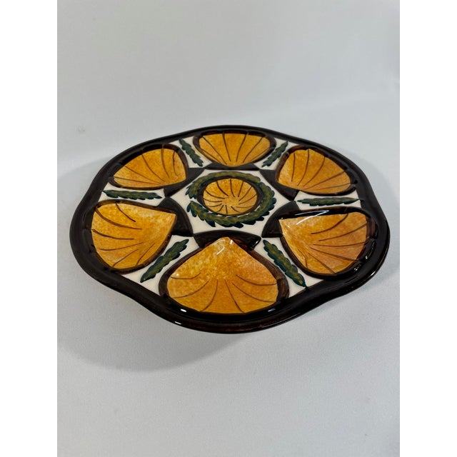 A beautiful hand painted French Faience Oyster Plate made by the French pottery workshop of Saint Jean de Bretagne in...
