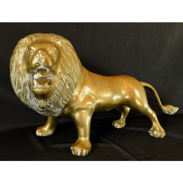 Wonderful large vintage mid century solid brass figural lion sculpture. He is very well done. He weighs 13 pounds. Circa...