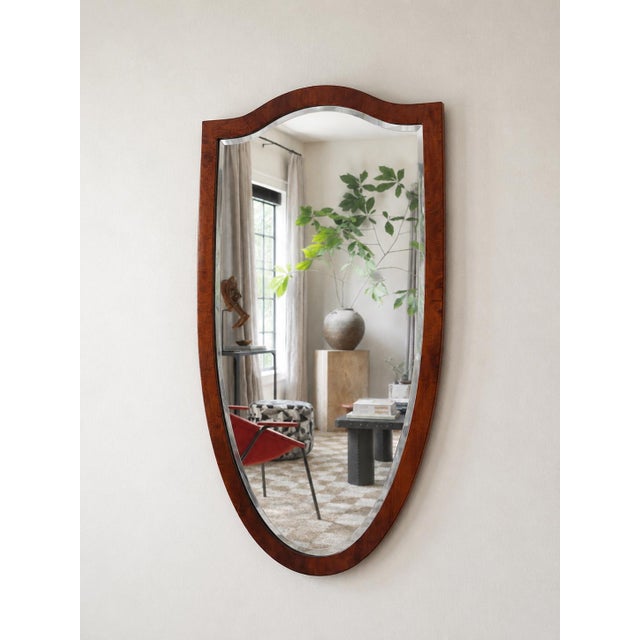 An exquisite and elegant antique 19th century wall mirror from vienna, austria, dating to circa 1825–1835 and representing...