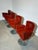 Elegant swivel armchair manufactured by Frag Italia, upholstered in high-quality red leather. A refined Italian design...