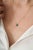 This pendant necklace is featuring a octagon-cut emerald set in 18K yellow gold. The measuring approximately 6 x 4 mm. The...