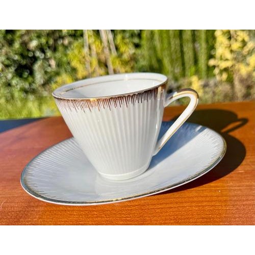 Beautiful high quality porcelain service, very fine geometric decorative pattern along the edge, applied by hand to each...