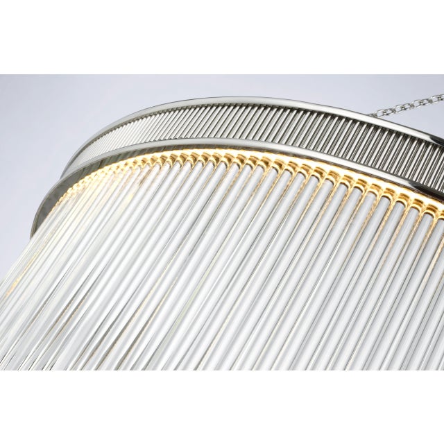 Menil Large Chandelier in Polished Nickel with Crystal Rods Designer: Marie Flanigan Canopy: 6" Round Mounting: Chain...