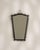 A tall wrought iron mirror with a softly tapered silhouette, adding subtle sculptural interest. The simple metal frame...