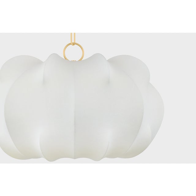 Light and voluminous, the Keilah pendant floats above a space like a cloud. The polymer shade features staggered ribs that...
