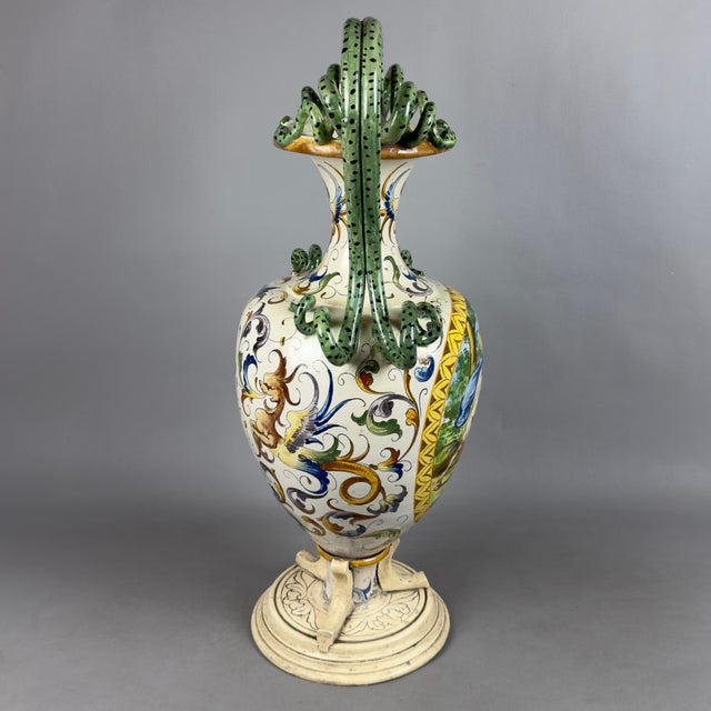 An imposing monumental ceremonial vase of Italian manufacture, inspired by the great historiated models of the Italian...