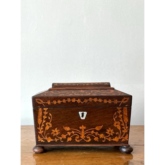 Capture the refined elegance of the English Regency period with this stunning antique marquetry box. Masterfully crafted...