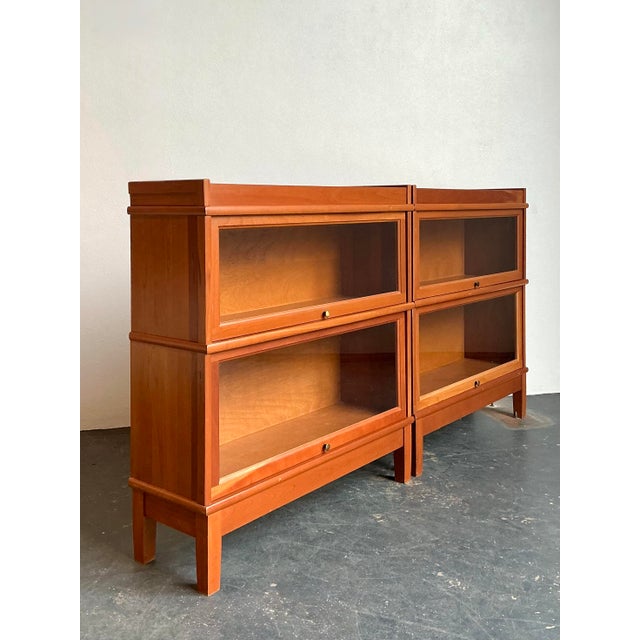 Elevate your library or professional study with this timeless pair of vintage Hale barrister bookcases. Expertly crafted...