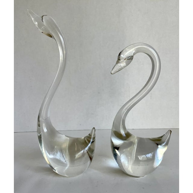 Here is such a lovely pair of glass/crystal swans. They look so pretty together and you can either have them facing the...