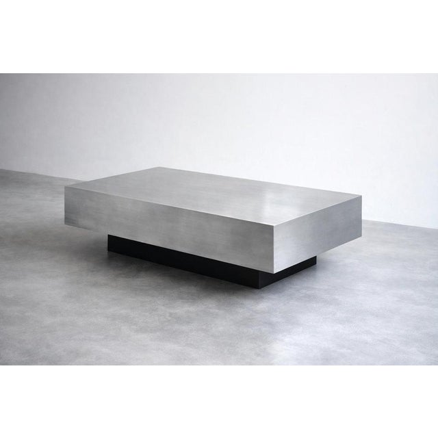 Floating Coffee Table in Brushed Aluminum by Veliento. Dimensions: W 110 x D 60 x H 32 cm (Size Medium). Materials: Aluminum.