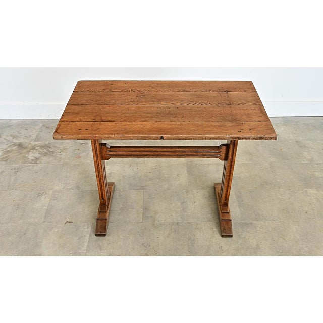 French, late 19th century solid oak table from a bistro or café, like an abbreviated refectory-style table for a wide...