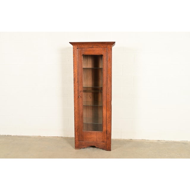 A gorgeous antique Mission or Arts & Crafts period bookcase cabinet or display cabinet In the manner of Stickley Brothers...