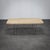 A timeless coffee table from 1970s italy, featuring a beautiful travertine stone top combined with slim metal legs. The...