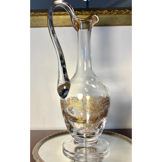 An exceptional antique crystal pitcher by Cristal de Sèvres, crafted in pure, luminous crystal of remarkable clarity and...