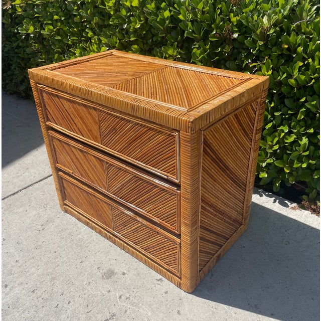 Gorgeous vintage boho dresser! It could also work as a large nightstand. It features pencil reed rattan in a chevron...