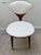 For sale is a set of six Norman Cherner for Plycraft dining chairs with white, faux leather padded seats and backs. The...