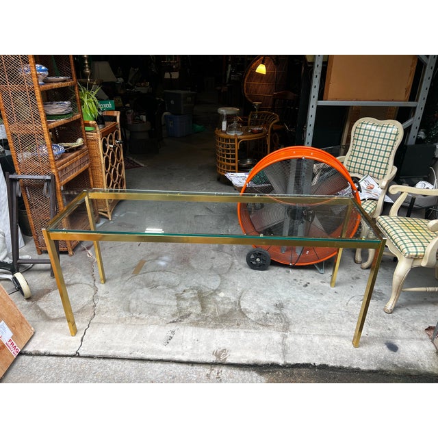 Up for consideration is a beautiful vintage gold metal glass top console table. This would look lovely in your home and it...