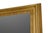 Dating from the 1990s, this Italian wall mirror features a richly gilded carved-wood frame inspired by the ornamental...