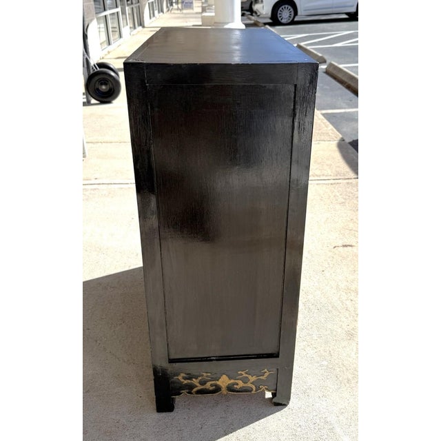 Wood Late 20th Century Heavily Carved Black Asian Cabinet With Gold Doors and Red Interior For Sale - Image 7 of 13