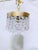A captivating blend of vintage charm and understated luxury, this elegant crystal chandelier brings a touch of old-world...