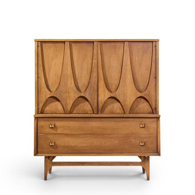 Broyhill Brasilia Mid Century Walnut Gentlemans Chest This gentlemans chest measures: 44 wide x 19 deep x 49.5 inches high...