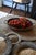 Originally used for grinding herbs and spices, this piece now serves as a striking decorative accent, perfect for holding...