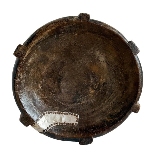 Vintage carved round wood three leg stool from the Hehe tribe of Tanzania. Concave bowl-like surface. Beautiful...