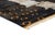 Deep, dramatic, and quietly playful. This hand-knotted Moroccan rug sets a bold visual contrast against a rich charcoal...