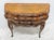 Italian burlwood 6 drawer commode made by Borghesani, serpentine and bombay form with carved legs and skirt, brass hardware.