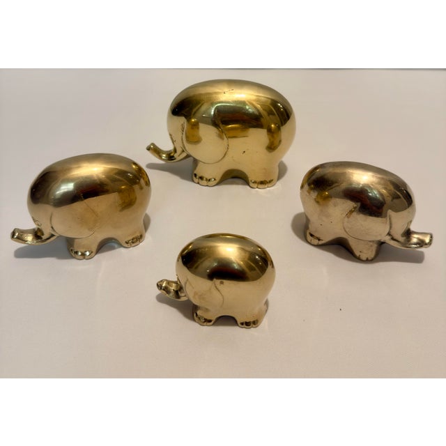 This charming "family" of four graduated elephants is the epitome of Hollywood Regency playfulness and Palm Beach...