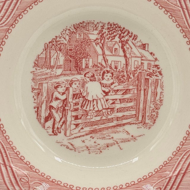 This matching set of seven vintage 1950s Royal Ironstone berry bowls showcases the enduring appeal of the Currier & Ives...