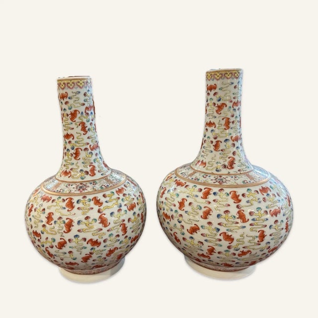 Qing dynasty, Guangxu Emperor (1875 - 1908.) Famille rose Fu bats and ruyi clouds reward vase. Vase shape is globular and...