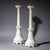 Pair of large altar candlesticks crafted from white marble with grey veining and fitted with brass candle sockets. The...
