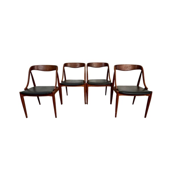 This set of four dinning chairs are a superb example of Scandinavian Modern design. These Model 16 chairs are designed by...