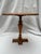 A single vintage wood side or drinks table featuring a rectangle top with cut corners, pedestal base, and orange painted...