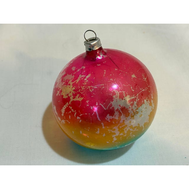 7 Vintage German handblown glass Christmas ornaments. The beautful ombre glass ornaments fade in color from pink to...