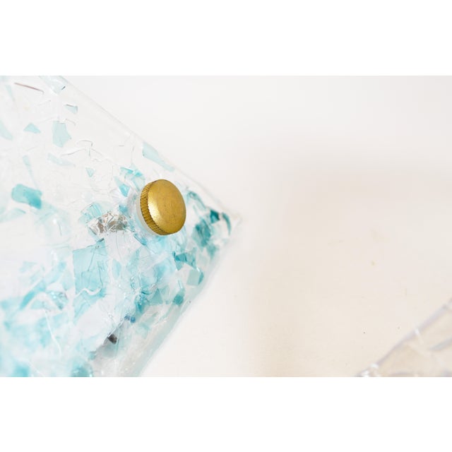 Decorative set of wall lamps by La Murrina in turquoise Murano glass. Both in near-new condition with minimal signs of age...