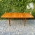 Vintage Scandinavian expandable teak dining table with internal leaf storage, made by Nordic Furniture Company c. 1980s....