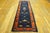 1920s Chinese Peking Carpet ( 3'2" x 11'8" - 97 x 357 ) On the rich navy ground, a two story pavilion rises on a wisp of...