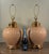 This fabulous pair of table lamps features ginger jar shaped ceramic bodies with raised faux bamboo texturing in a warm...