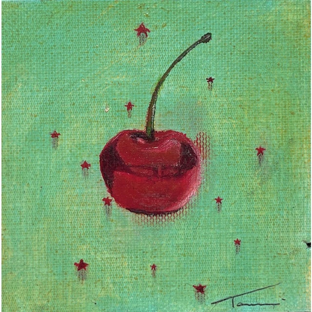 Cherry Jubilee by Tammi Otis | Oil on Canvas Painting of a red cherry on a green background For Sale