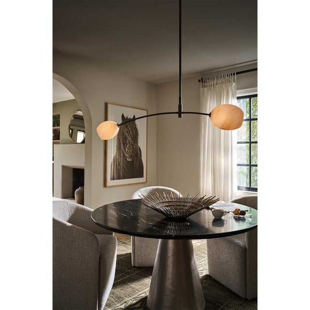 Artemis blends sleek design with the allure of artisan-crafted glass. Its open-ended Alabaster-like glass globes add moody...