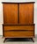 Add timeless style and exceptional craftsmanship to your home with this beautiful mid-century walnut highboy dresser....