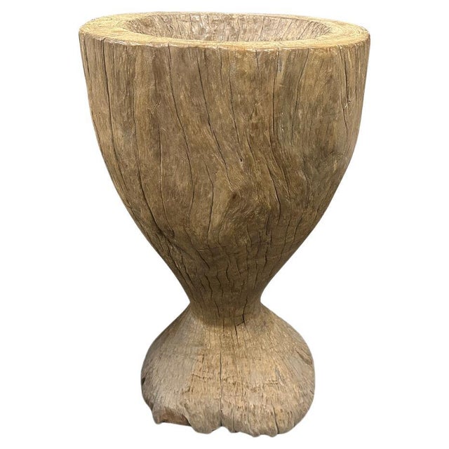 An original antique rice pounder hand carved from a single teak root. Both usable and sculptural. So many uses for this...