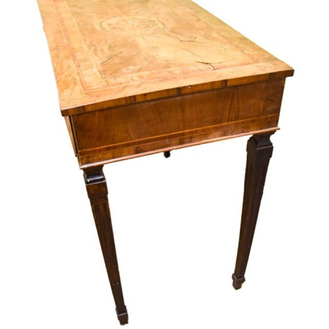 An antique Louis XVI style ladies’ dressing table, small writing desk or console table in flame mahogany with a...